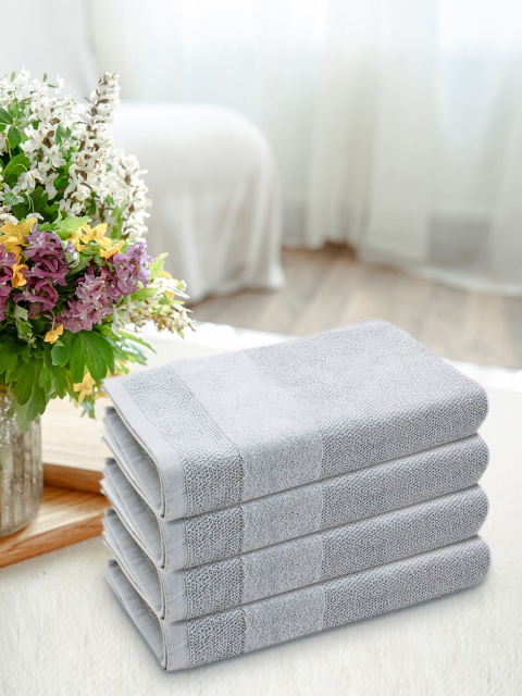 

Pure Home and Living Set Of 4 Blue Solid 550 GSM Cotton Hand Towels
