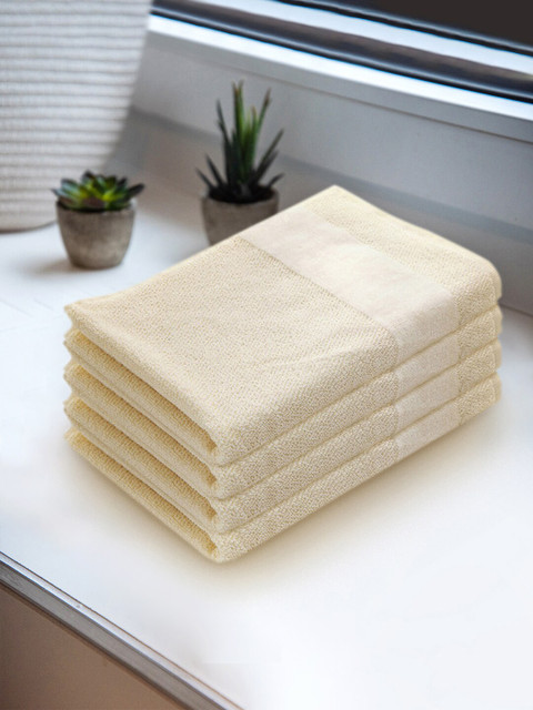 

Pure Home and Living Set Of 4 Cream-Coloured Solid 550 GSM Cotton Hand Towels