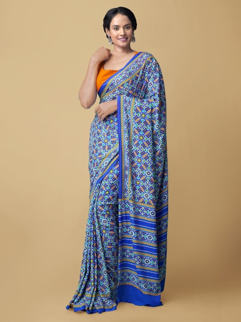 

Unnati Silks Blue & Mustard Paisley Pure Crepe Patola Saree
