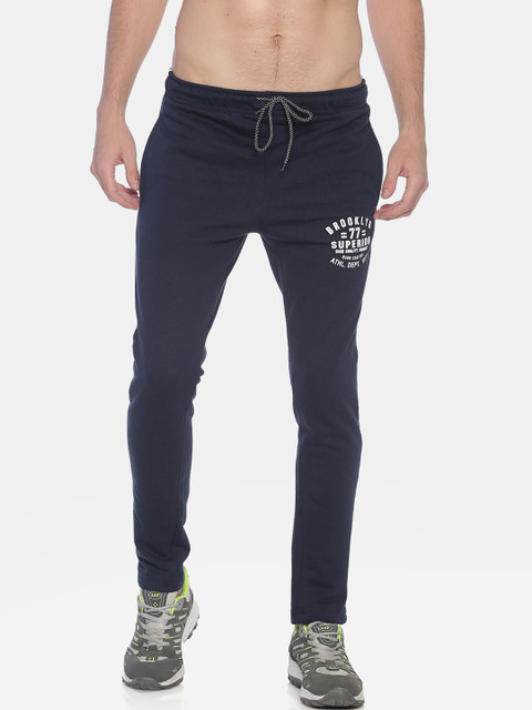

MASH UNLIMITED Men Navy Blue & White Solid Track Pants