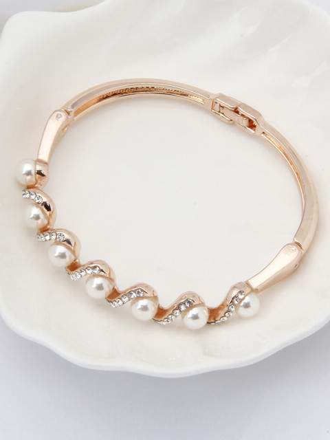 

YoungWildFree Women Gold-Toned & White Brass Cubic Zirconia Gold-Plated Bangle-Style Bracelet