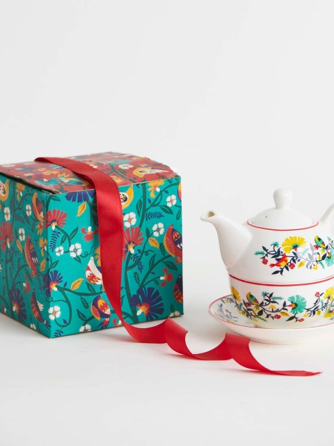 

Chumbak White & Yellow Printed Bone China Glossy Kettle