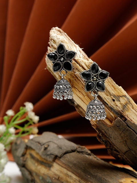 

NEUDIS Silver-Toned & Black Stone Studded Floral Antique Jhumkas Earrings