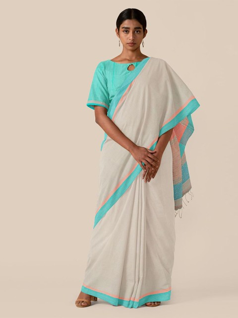 

Taneira Beige & Blue Solid Bengal Pure Cotton Saree