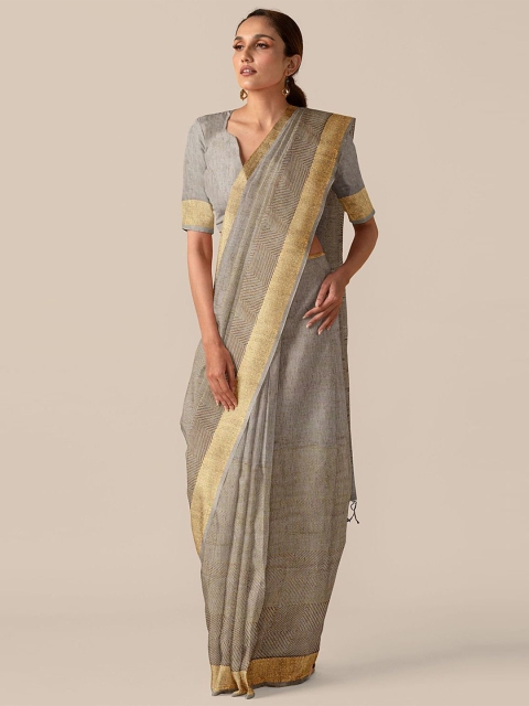 

Taneira Beige Woven Design Zari Pure Linen Saree