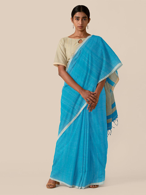 

Taneira Turquoise Blue & Biege Pure Cotton Saree