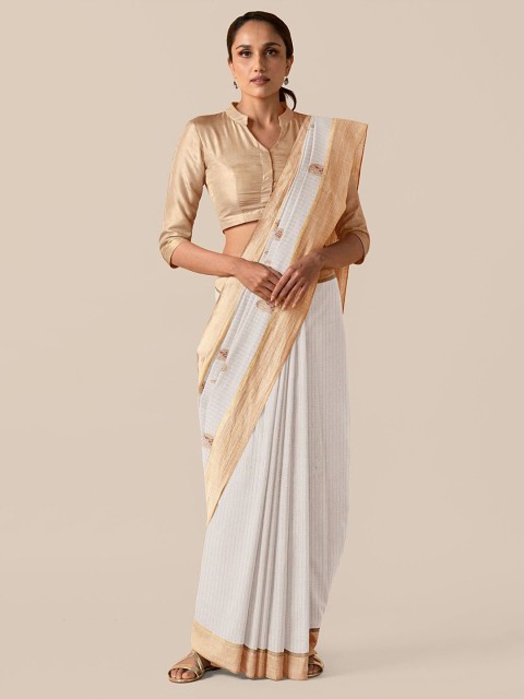 

Taneira White & Gold Coloured Woven Design Pure Cotton Saree