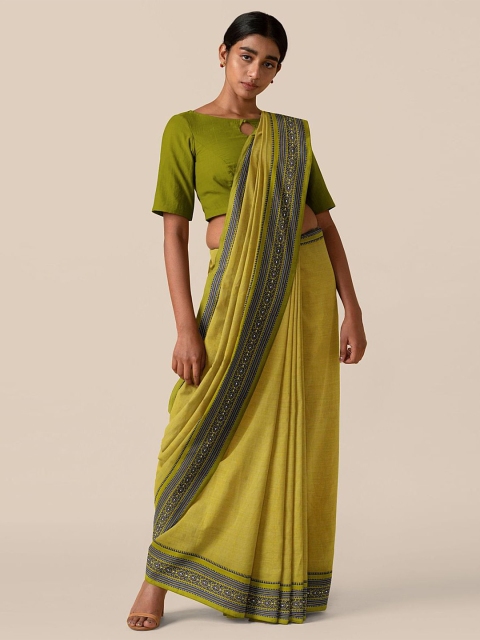 

Taneira Olive Mirror Work Pure Cotton Saree