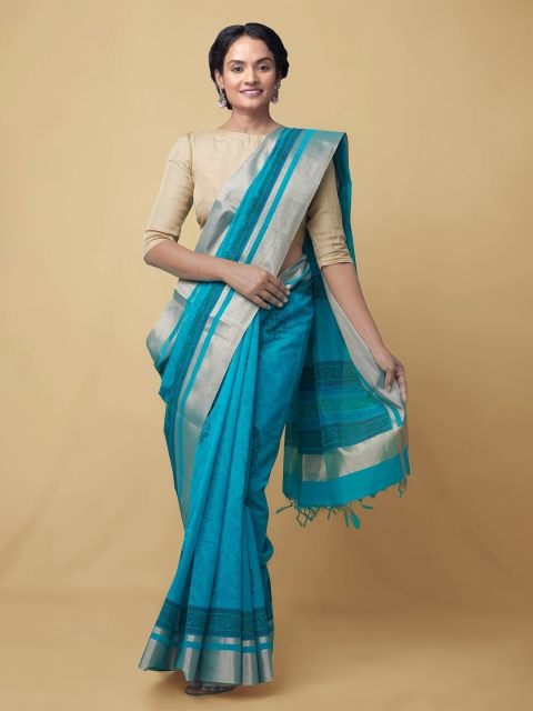 

Unnati Silks Turquoise Blue Woven Design Silk Cotton Chanderi Saree