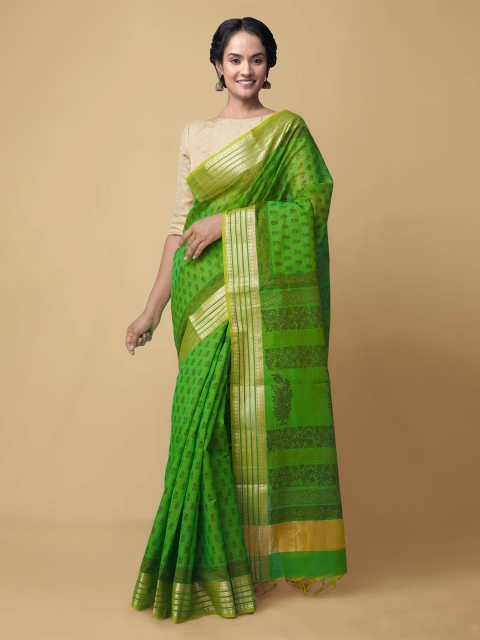 

Unnati Silks Green & Brown Ethnic Motifs Silk Cotton Chanderi Saree