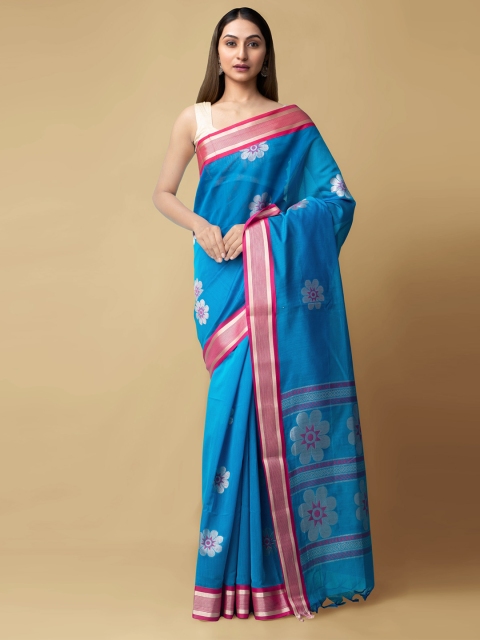 

Unnati Silks Blue & White Floral Silk Cotton Baluchari Saree