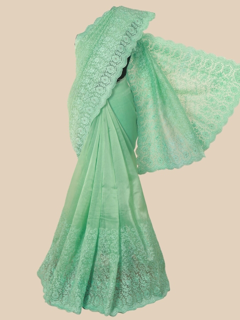 

Pothys Green Floral Zari Net Saree