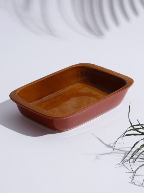 

Fabindia Brown Solid Ceramic Glazed Serving Dish
