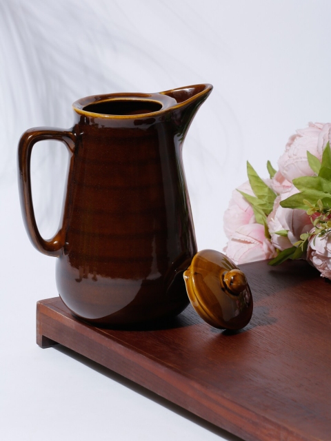 

Fabindia Brown Solid Ceramic Glazed Water Jug