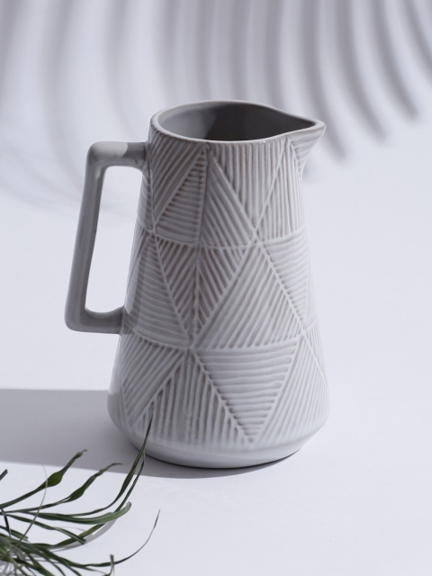 

Fabindia Grey Ceramic Udyati Engraved Mug