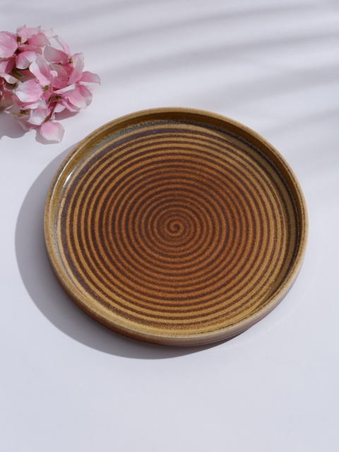 

Fabindia Brown Textured Ceramic Jaksh Glazed Ceramic Plate