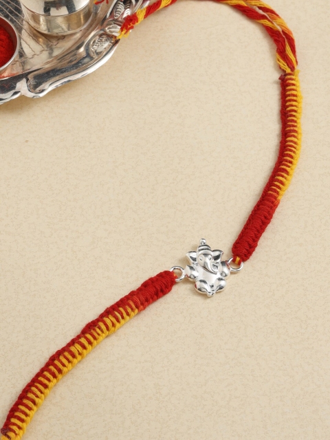 

ADORN by Nikita Ladiwala Sterling Silver Ganesh Ji Rakhi With Roli Chawal