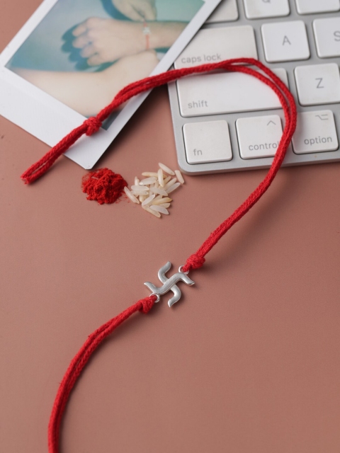

Adorn By Nikita Sterling Silver Swastik Rakhi With Roli Chawal
