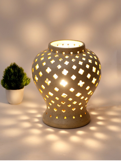 

Fabindia White & Tan Textured Ceramic Contemporary Table Lantern
