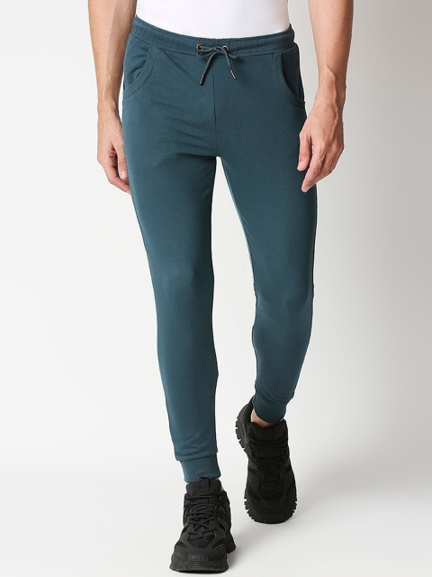 

Bewakoof Men Green Solid Joggers