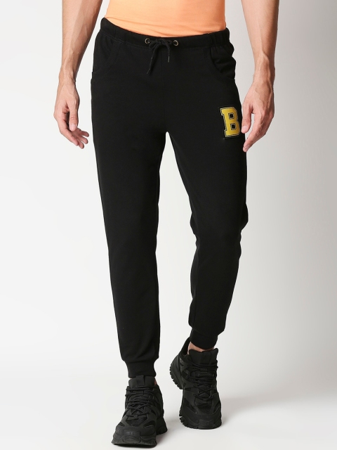 

Bewakoof Men Black Solid Straight-Fit Joggers