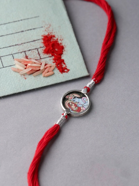 

ADORN by Nikita Ladiwala Red Sterling Silver Hand-Painted Radha Krishna Rakhi