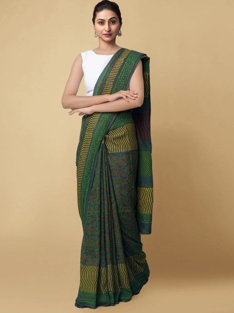 

Unnati Silks Green & Red Ethnic Motifs Art Silk Handloom Dabu Saree