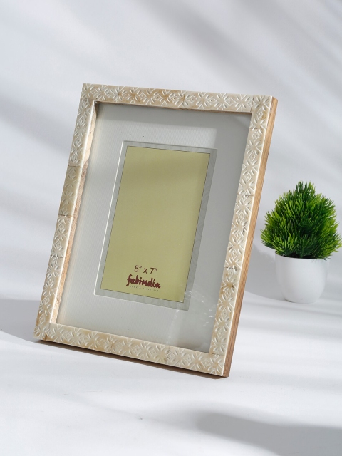 

Fabindia White & Beige Ajmal Cutwork Table Photo Frame