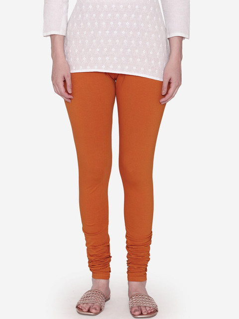 Vami Women Orange Solid Churidar-Length Leggings