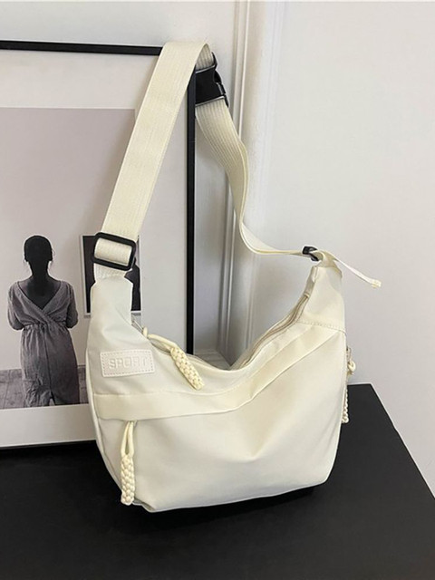 StyleCast x Revolte Half Moon Sling Bag