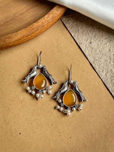 NAMAN ARTS Silver-Plated Stones Studded & Beaded Animal Shaped Oxidised Drop Earrings