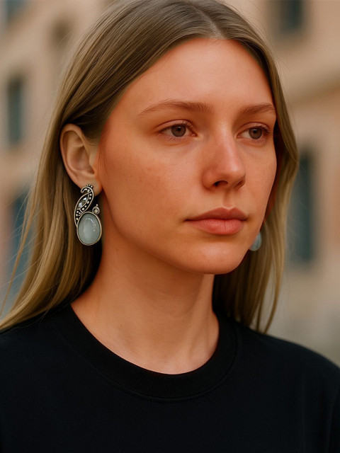 The Style Courtyard Artificial Stones Studded Oxidised Peacock Shaped Drop Earrings
