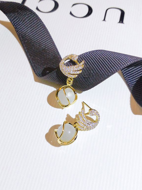 Anouk Gold Plated Pearls And Stones Studded Contemporary Shaped Korean Drop Earrings