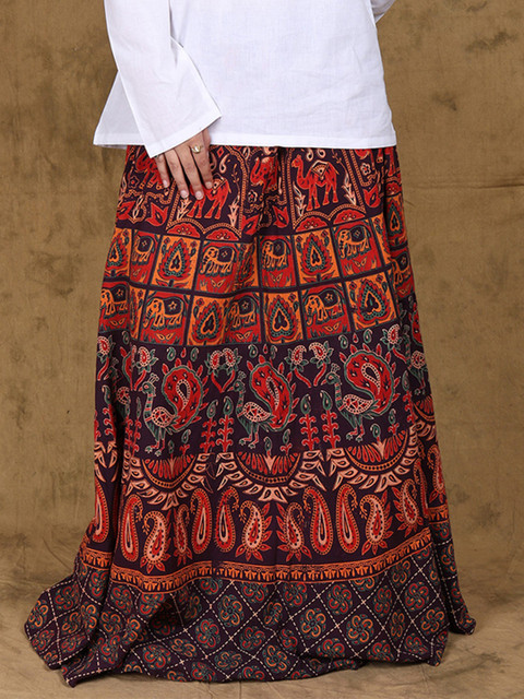 Exotic India Animal Printed Pure Cotton Wrap Around Flared Maxi Skirts