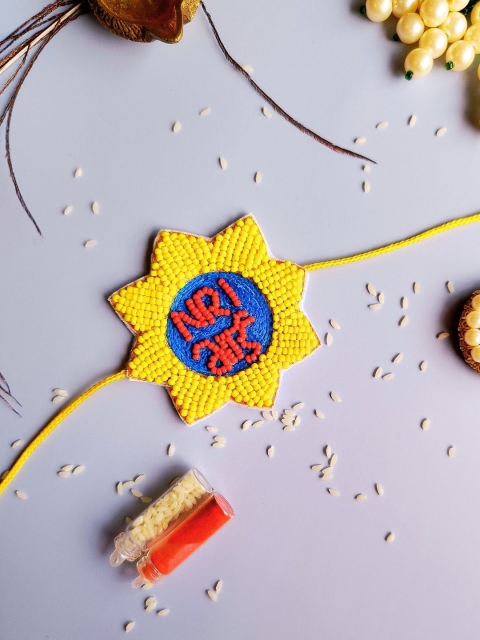 Sangria Blue & Yellow Beaded Thread Rakhi