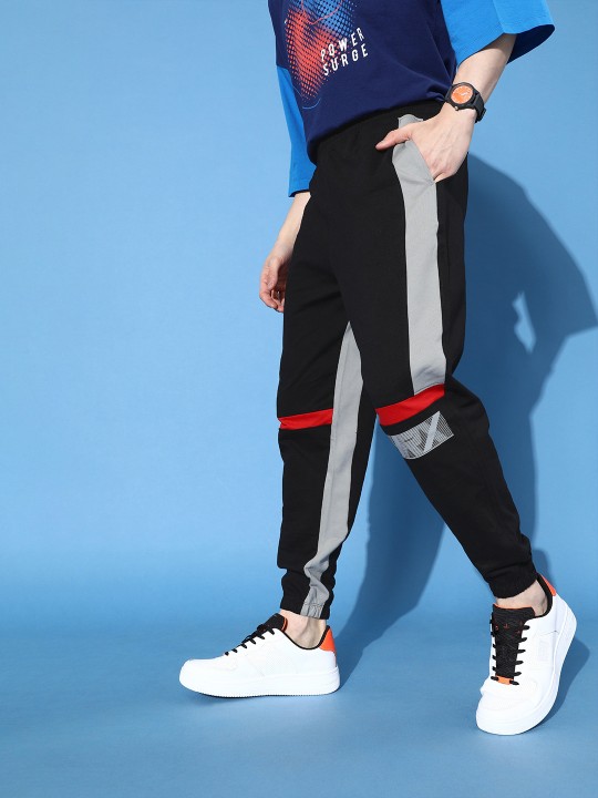 Men Stylish Black Solid Updated Joggers deal from myntra