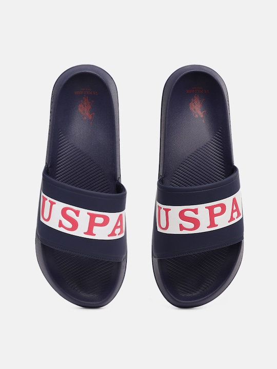 U.S. Polo Assn.
Men Navy Blue & White Brand Logo Print Sliders with Textured Detail