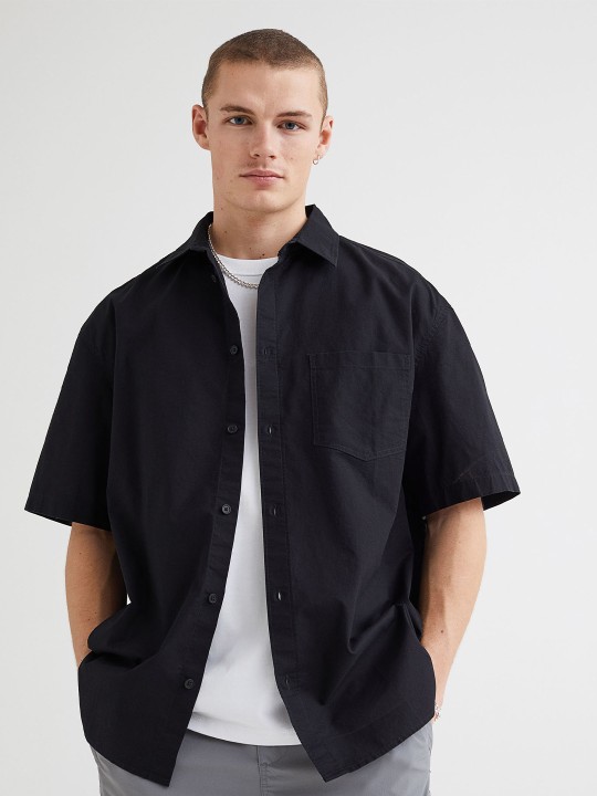 Men Black Solid Relaxed Fit Short-Sleeved Shirt deal from myntra