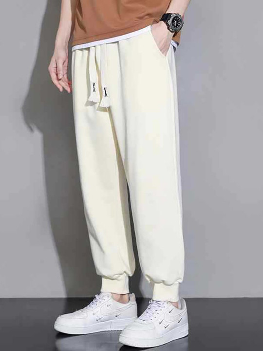 StyleCast x Revolte Men Regular Fit Jogger Trousers