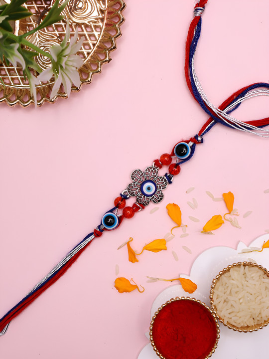Myntra Elegant Homes Set Of 3 3 Rakhis With Roli Chawal & Greetings Card