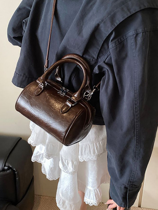 StyleCast x Revolte Women Textured Bowling Sling Bag