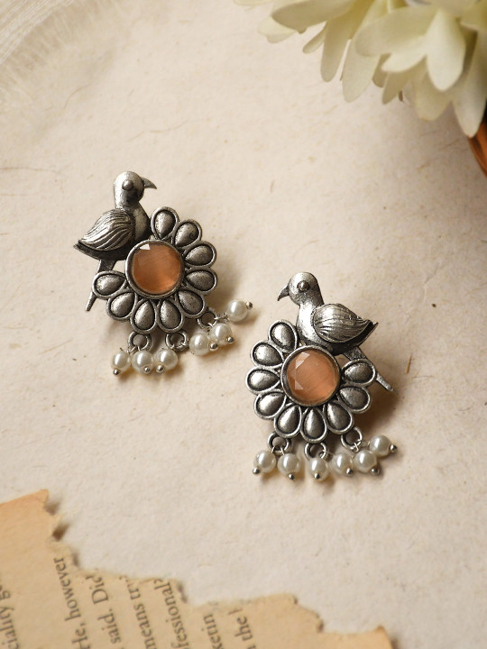 NAMAN ARTS Silver-Plated Stones Studded & Beaded Oxidised Animal Shaped Drop Earrings