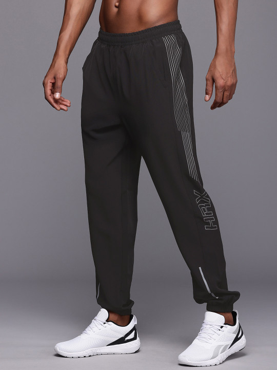 HRX by Hrithik Roshan Men Rapid-Dry Training Track Pants With Side Stripe Detail