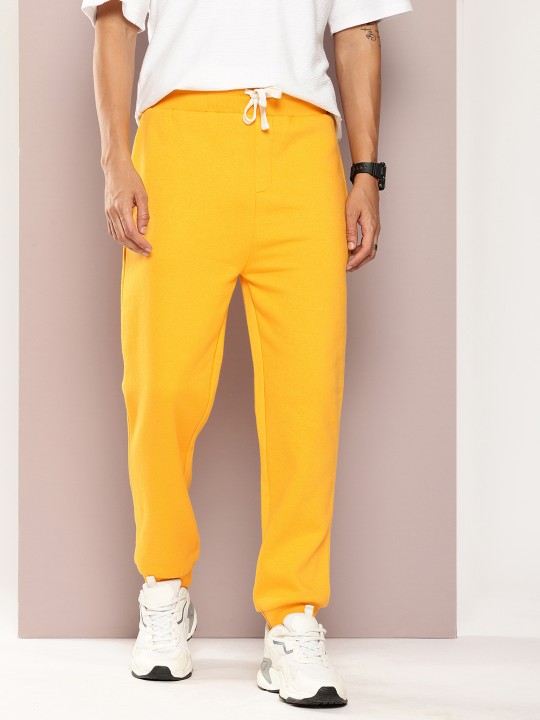 Men Solid Relaxed Joggers deal from myntra