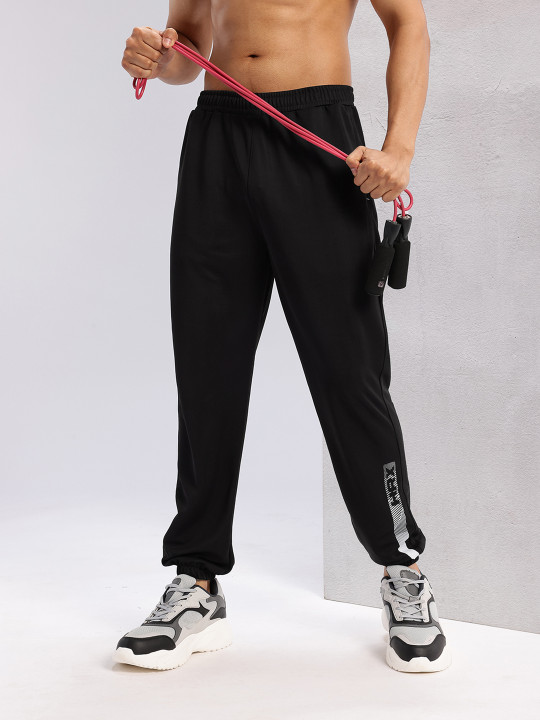 HRX by Hrithik Roshan Men Brand Logo Print Detail Mid-Rise Rapid-Dry Training Joggers