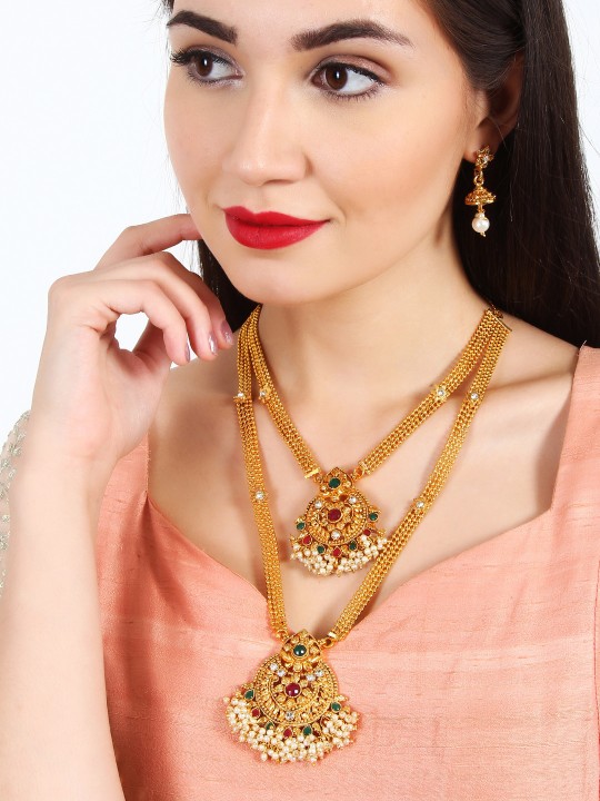 gold earrings with necklace