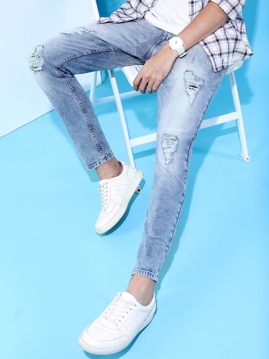 Men Blue Tapered Fit Mid-Rise Mildly Distressed Stretchable Jeans deal from myntra