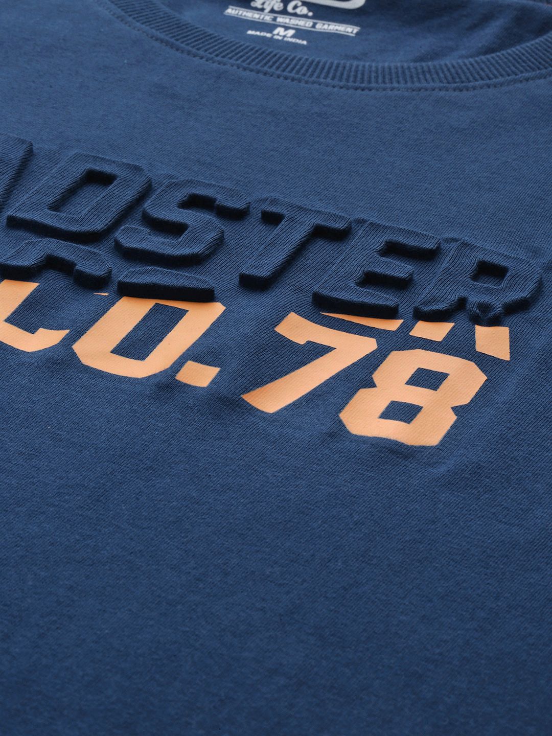 Roadster Men Navy Blue Embossed Printed Round Neck T-shirt (Image - 1)