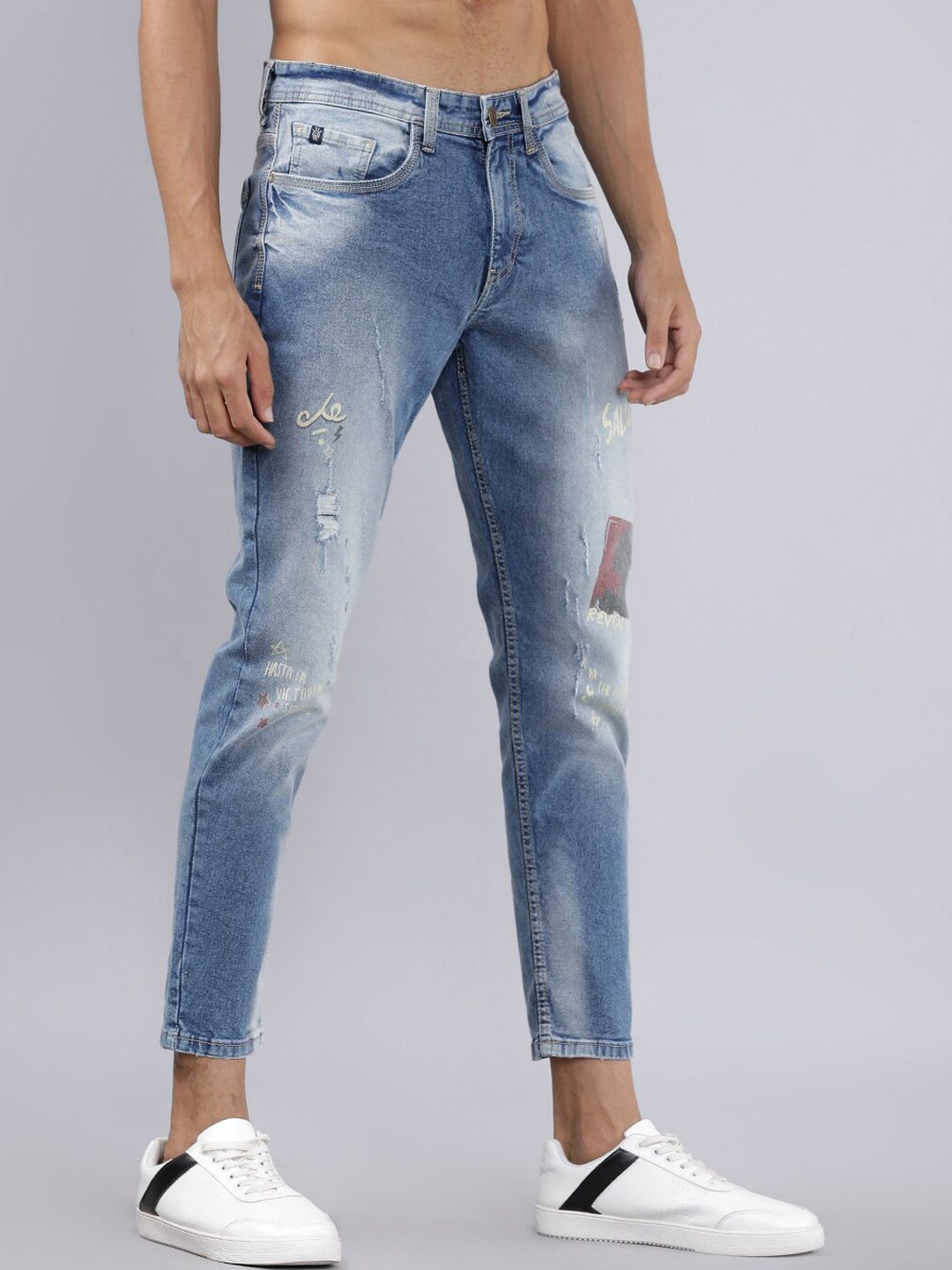 LOCOMOTIVE Men Blue Tapered Fit Mid-Rise Mildly Distressed Stretchable Jeans (Image - 1)