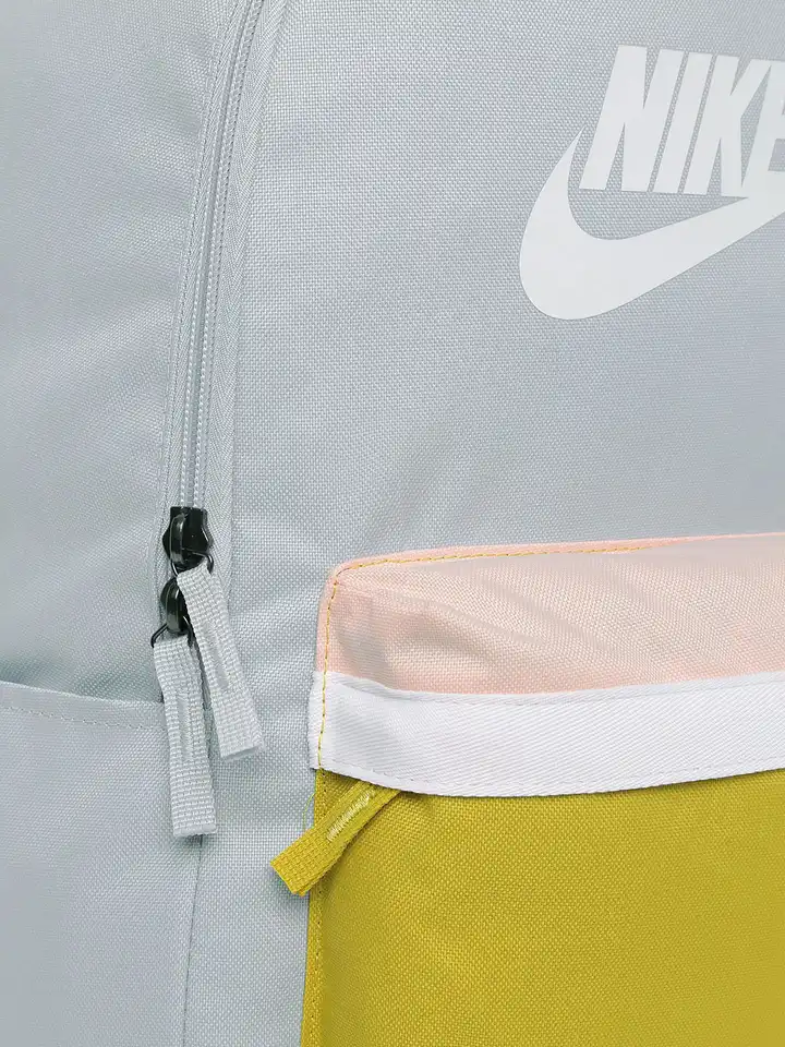grey and yellow nike backpack